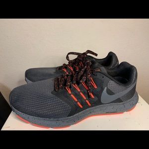 Men’s Black and orange Nikes